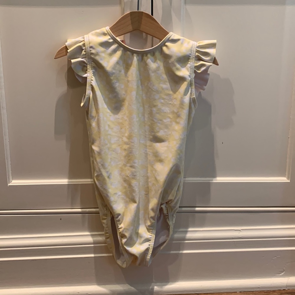 Minnow yellow one piece with mauve tie